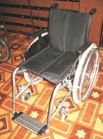 Велоприставки к инвалидным коляскам